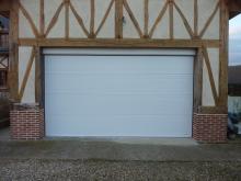 Porte de garage sectionnelle, refoulement sous plafond.JPG